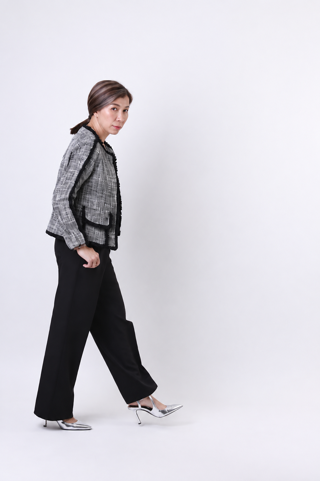 Worakamol Meepiarn walking in a grey-jacket editorial portrait